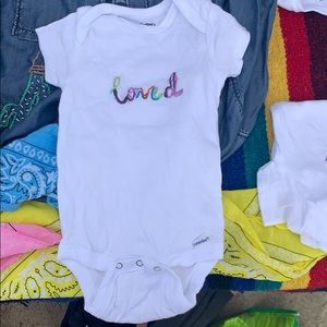Adorable hand embroidered onsie